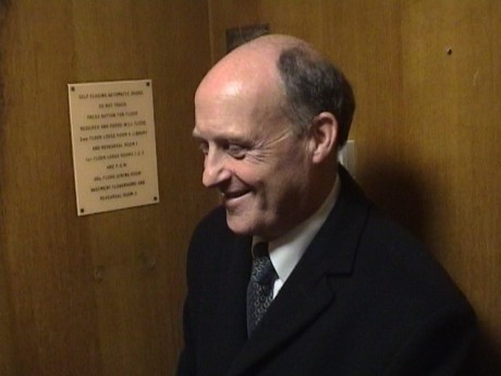 Freemason operating the lift at Bristol Freemasons Hall, Park Street